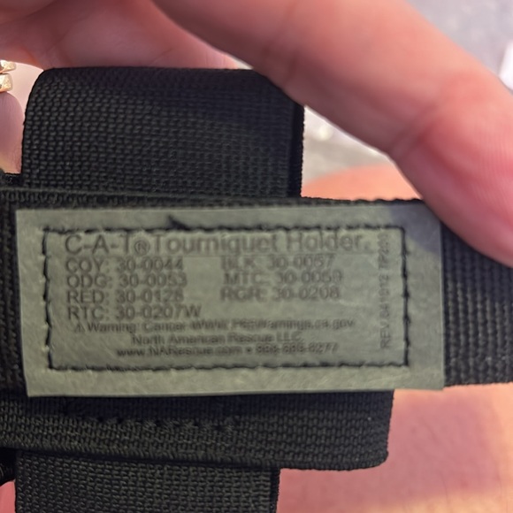 Like new in package North American rescue tourniquet holder black - Picture 2 of 3